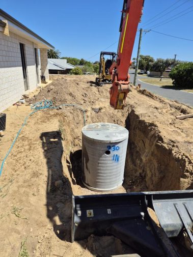 Secondary septic tank being installed